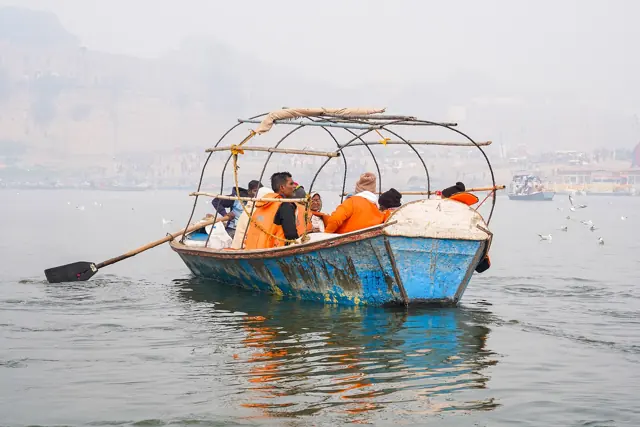 Pilgrims in a boat at the Sangam