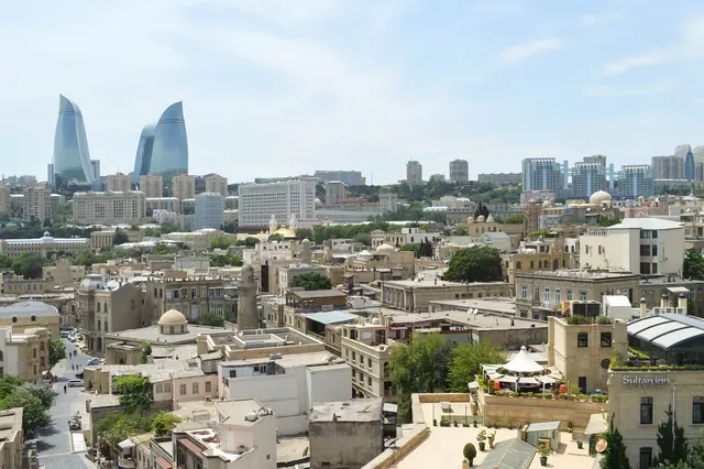 Rooftops of Baku Old City with the Flame Towers on the skyline