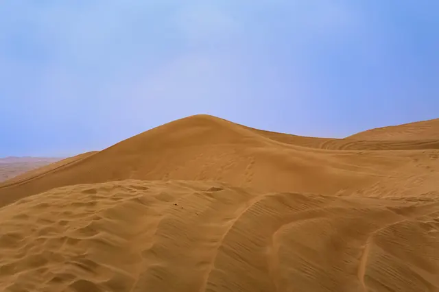 Golden sand dunes in the desert outside Dubai
