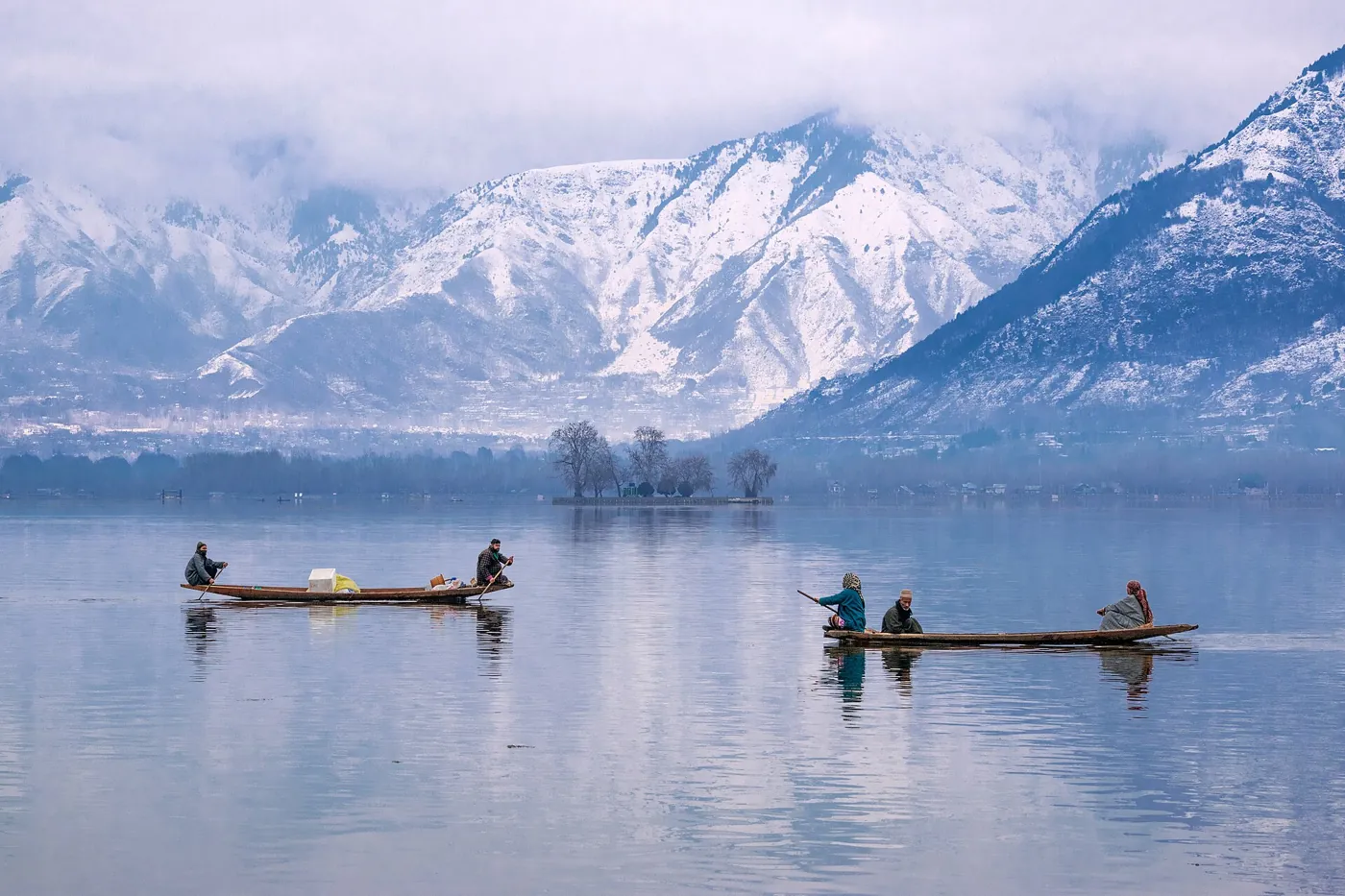 Shikaras on Dal Lake below snow-capped mountains, Srinagar