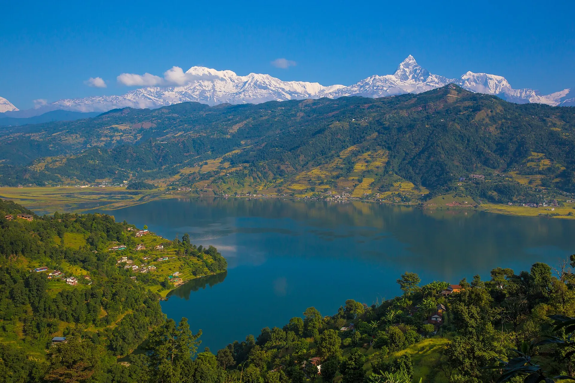 Phewa Lake in Pokhara with the snow-capped Annapurna range behind