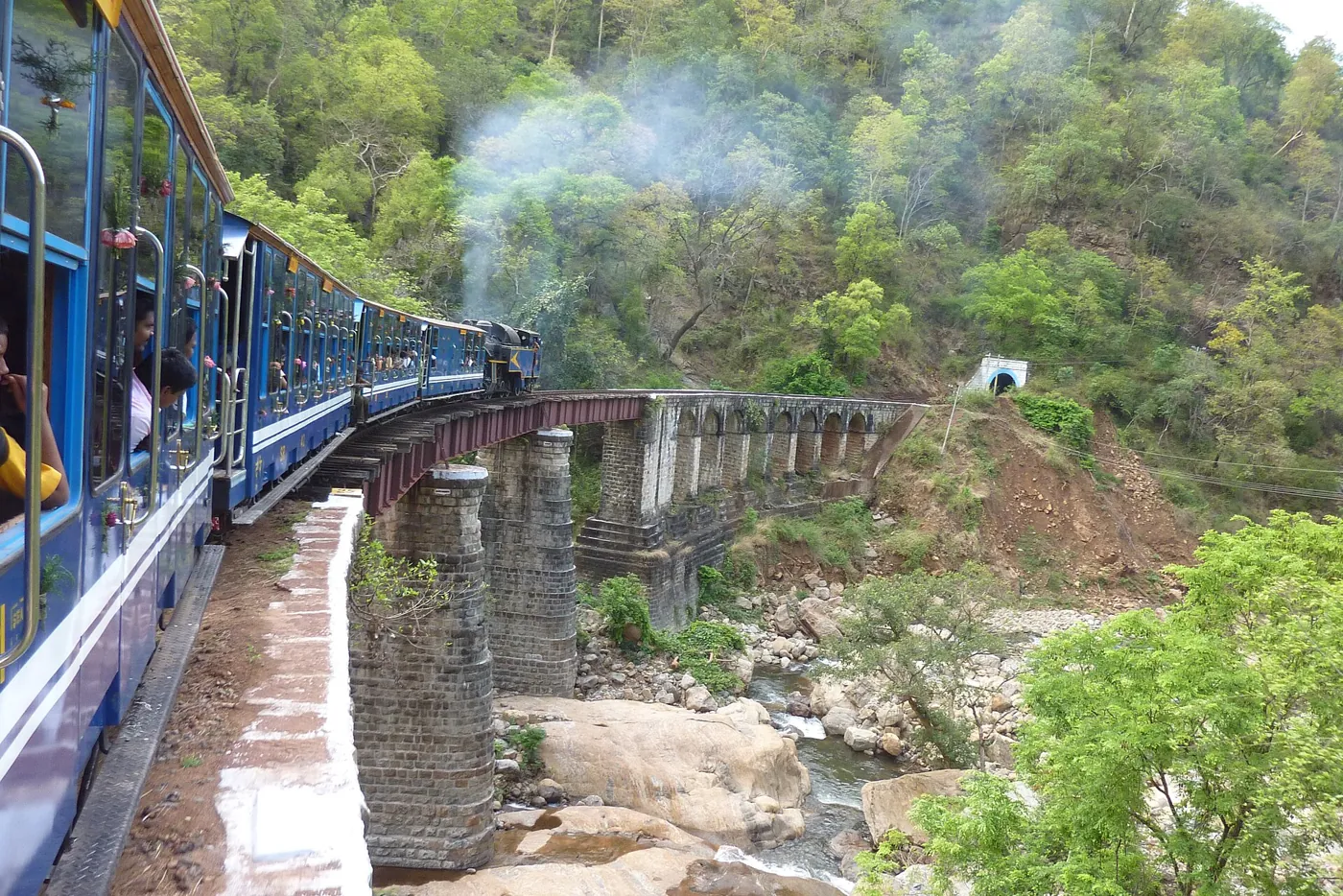Nilgiri Mountain Railway toy train crossing a bridge